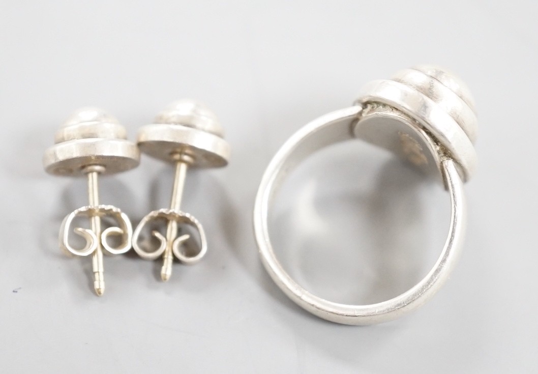 A Georg Jensen sterling 925 ring, no. 46B, size K/L and a pair of similar earrings, no.8.